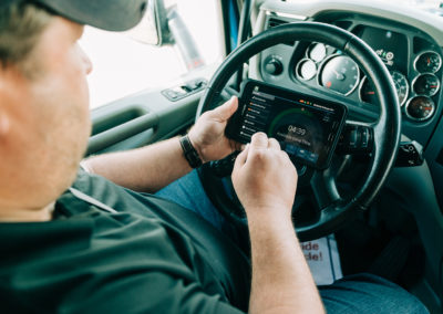 Truck Driver entering digital log